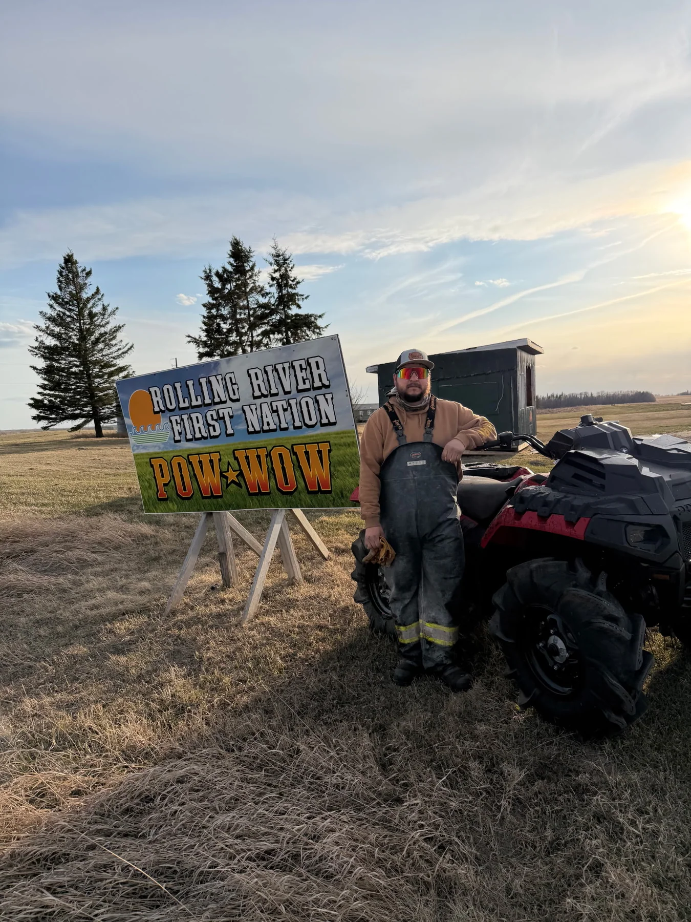 Customer standing with an ATV outside