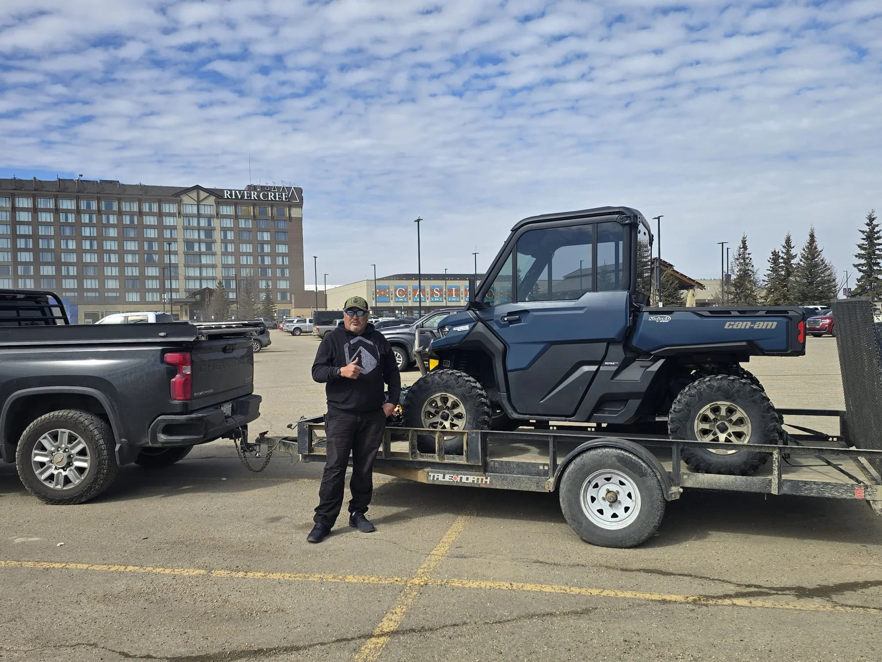 Customer with a side-by-side on a trailer